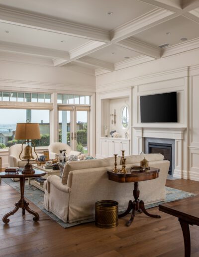 A living room with hardwood floors and a tv.